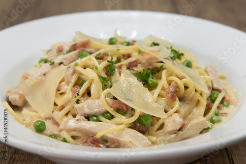 Hearty bowl of chicken carbonara pasta made fresh and served hot for dinner