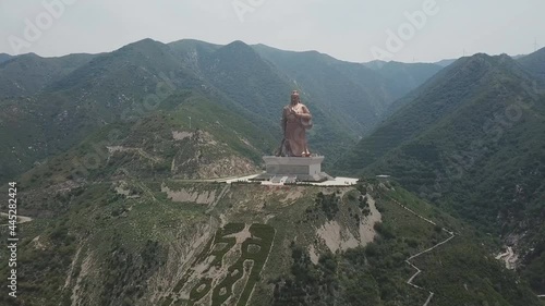 aerial view of a giant bronze statue of Chinese General Guan Yu in Yuncheng city, north China's Shanxi province photo