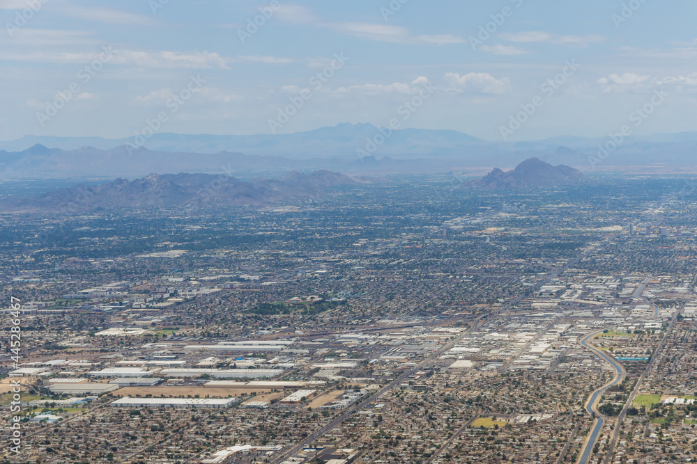 Aerial View of a near mountain range in skyline Phoenix, Arizona