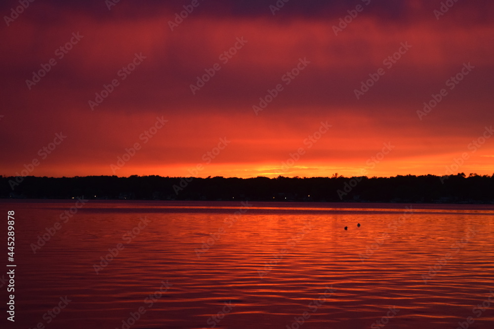 red sunset on lake