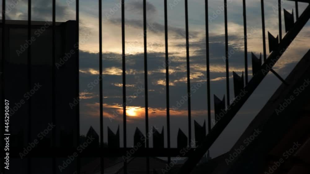 4k Timelapse sunset with iron trellis foreground 4k Timelapse sunset with iron trellis foreground