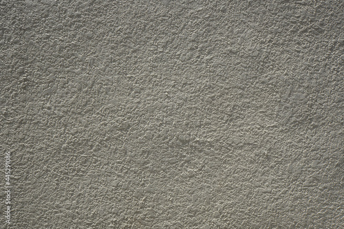 Gray and white stucco texture background. Acrylic plaster facade closeup