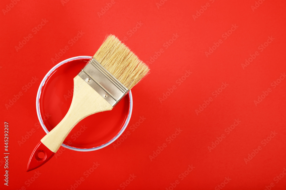 Paint cans color palette with paint brush on red background,home renovation concept Paint cans color palette with paint brush on red background,home renovation concept