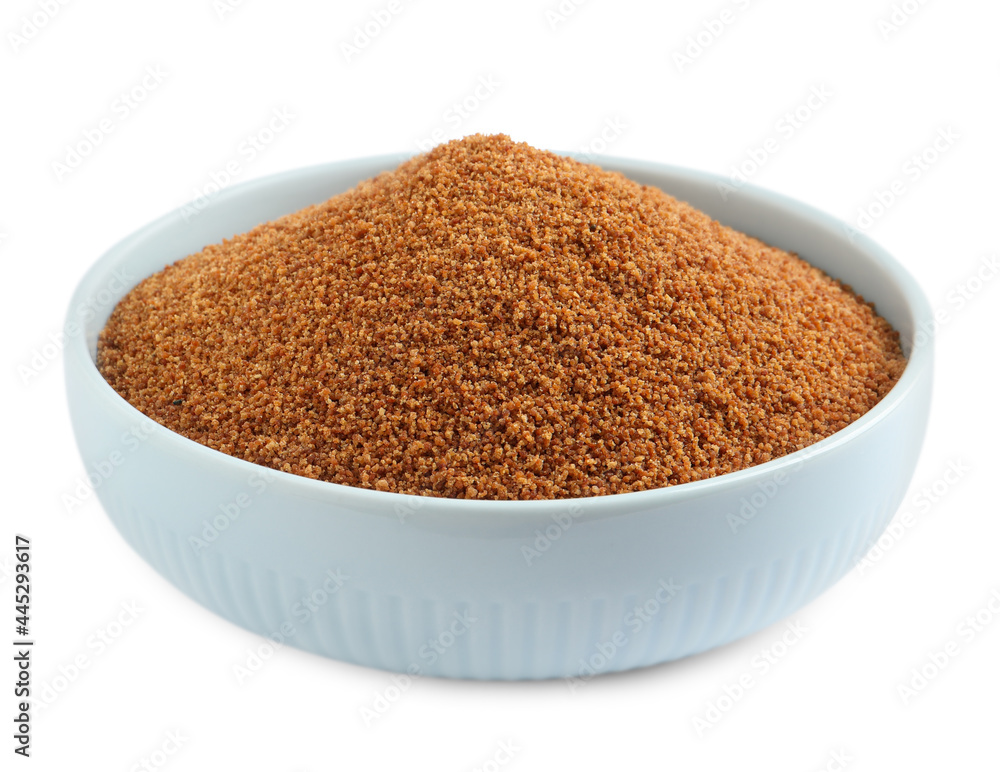 Natural coconut sugar in bowl isolated on white Natural coconut sugar in bowl isolated on white
