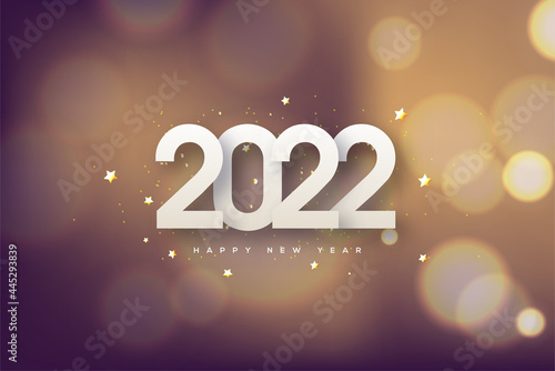 Happy new year 2022 with elegant numbers on a blur background.