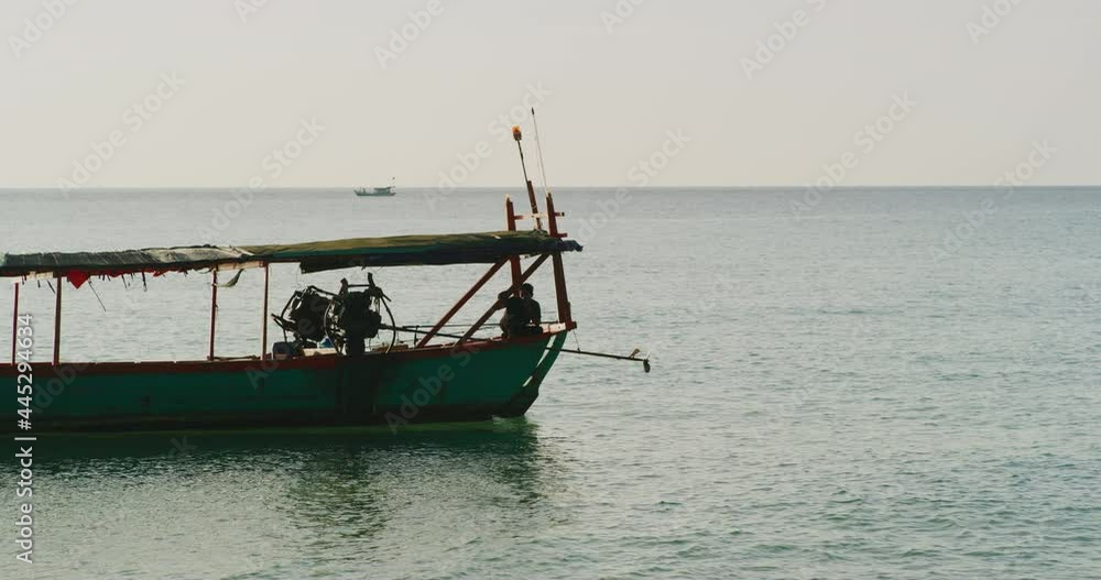 Fishing Boat on Koh Rong Samloem Island Off The Coast Of Sihanoukville, Cambodia Fishing Boat on Koh Rong Samloem Island Off The Coast Of Sihanoukville, Cambodia
