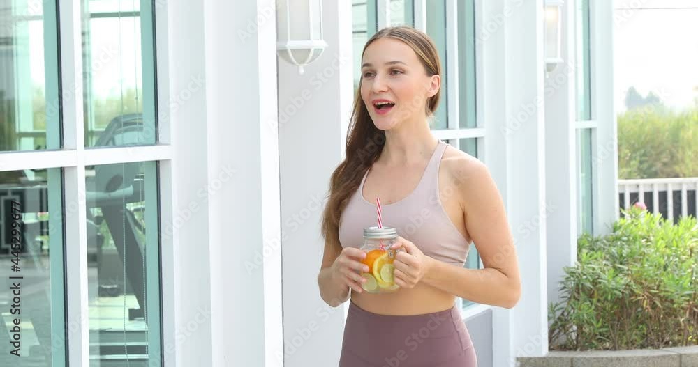 Caucasian girl eat clean food after exercise at home Caucasian girl eat clean food after exercise at home