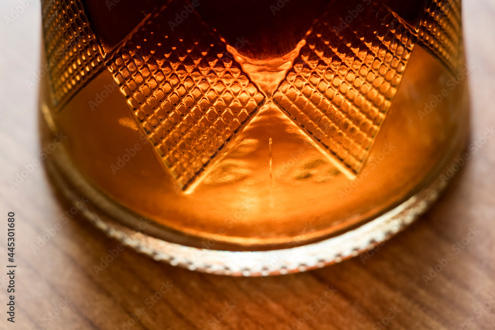 The brandy decanter is on a close-up of the kitchen table.