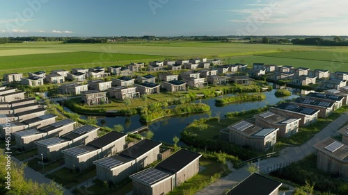 Roompot Water Village Beside The Green Farmland In Kamperland Town In The Dutch Province Of Zeeland. aerial photo