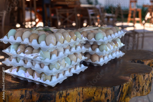 eggs stacked in styrofoam trays 