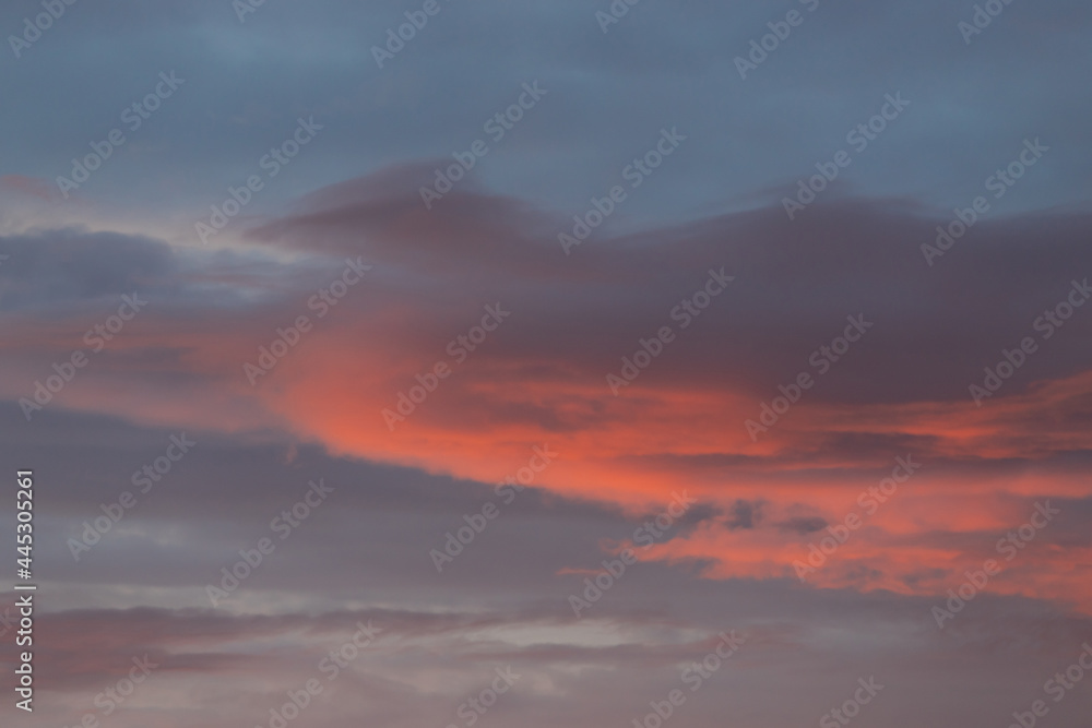 Colorful clouds on dawn sky.