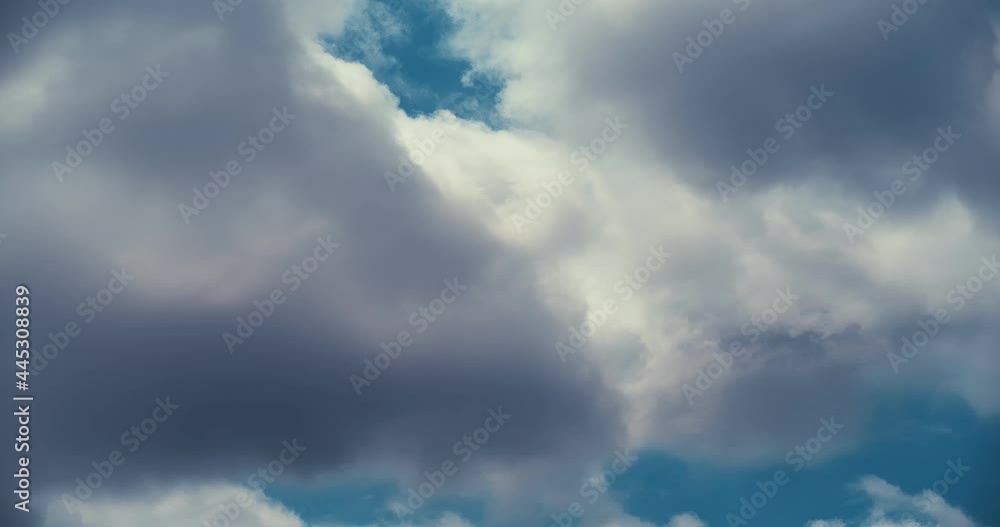 Blue sky with clouds time lapse slow motion 4K DCI 60 fps Blue sky with clouds time lapse slow motion 4K DCI 60 fps