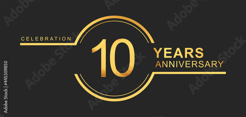 10th years anniversary golden and silver color with circle ring isolated on black background for anniversary celebration event