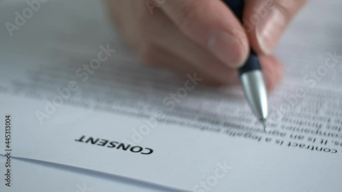 Reading documents on informed consent to the processing of personal data.