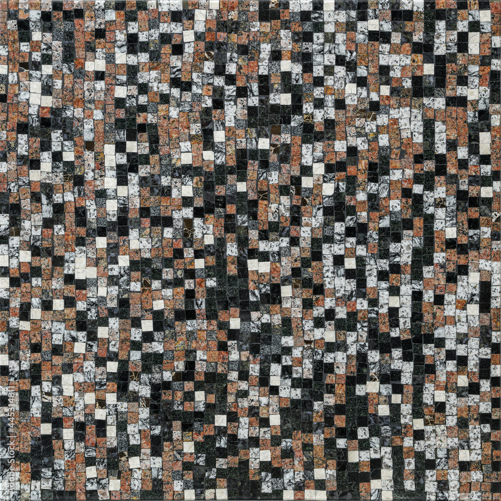 Floor or wall tiles or mosaics consisting of small cubes of black, white and brown color. Textured background for text or mockup Floor or wall tiles or mosaics consisting of small cubes of black, white and brown color. Textured background for text or mockup