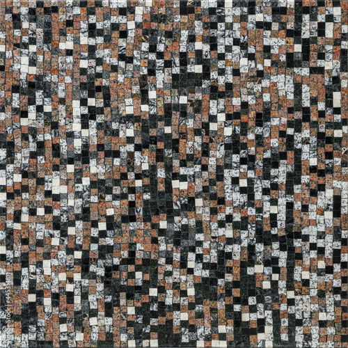 Floor or wall tiles or mosaics consisting of small cubes of black, white and brown color. Textured background for text or mockup