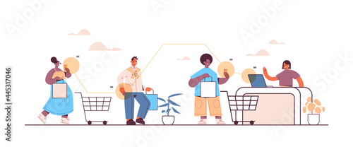 mix race customers using smartphones for paying at cash desk online shopping ecommerce smart purchasing
