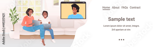 woman and little son discussing with husband in web browser window self-isolation virtual meeting