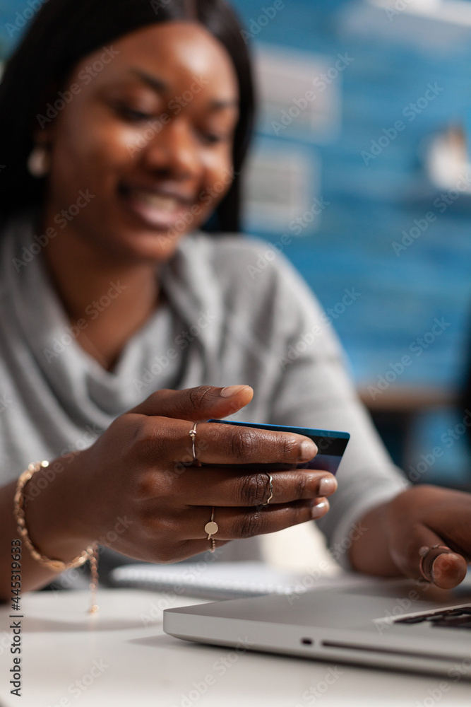 Black Woman Customer Holding Credit Card Doing Electronic Transcation