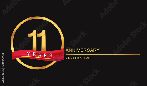 11th years anniversary celebration with golden color and ring, red ribbon for anniversary celebration