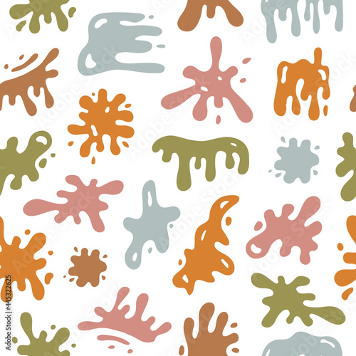 Colorful seamless pattern with  hand drawn splashes and stains of various shapes on white background. Modern vector illustration	