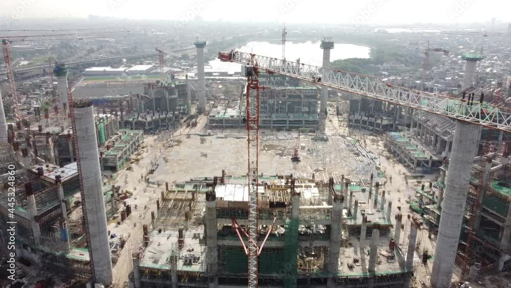 Aerial view of a construction
the stadium is close to the highway and residential areas Aerial view of a construction
the stadium is close to the highway and residential areas