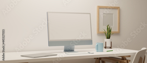 Cozy working space design with computer monitor mock-up with decorations in white room © bongkarn