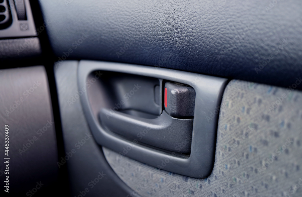 Closeup of modern car's inner door handle