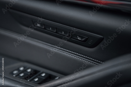Wallpaper Mural Car seat massage control panel. Massagers button. Close-up of the luxury car black interior. Torontodigital.ca