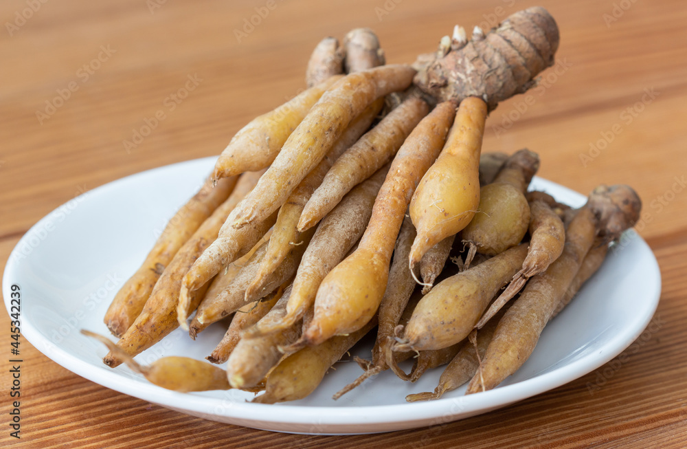 Finger root, Kaempferia Herbs healthy on white plate. Finger root, Kaempferia Herbs healthy on white plate.