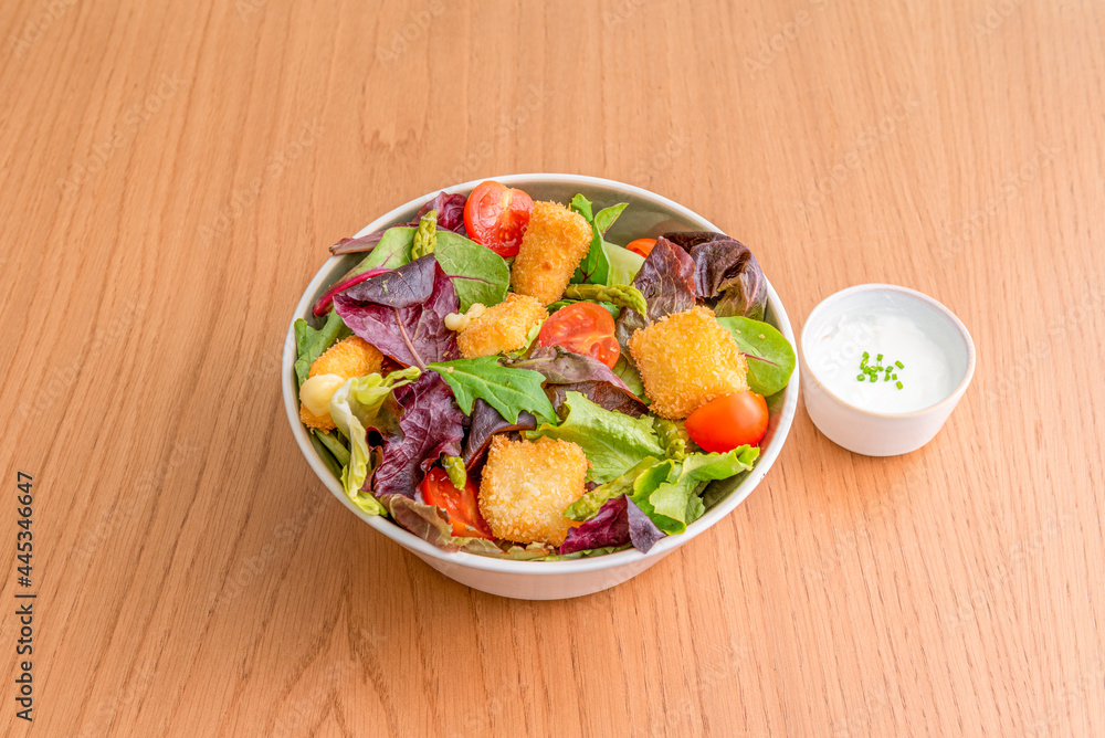mixed lettuce sprout salad, chicken nuggets, green asparagus, cherry tomatoes and mayonnaise sauce mixed lettuce sprout salad, chicken nuggets, green asparagus, cherry tomatoes and mayonnaise sauce