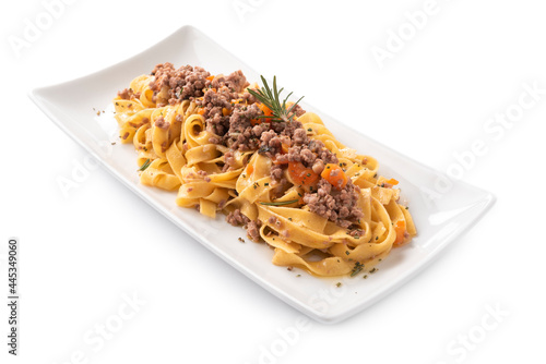 Piatto di deliziose tagliatelle al ragu isolato su fondo bianco, Cucina Italiana photo