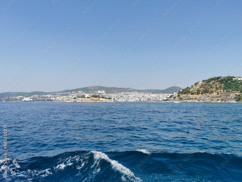 Panorama of the mountains, the Aegean Sea and the city of Kusadasi. Turkey