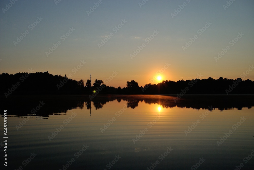 Summer fishing on the lake, dawn.