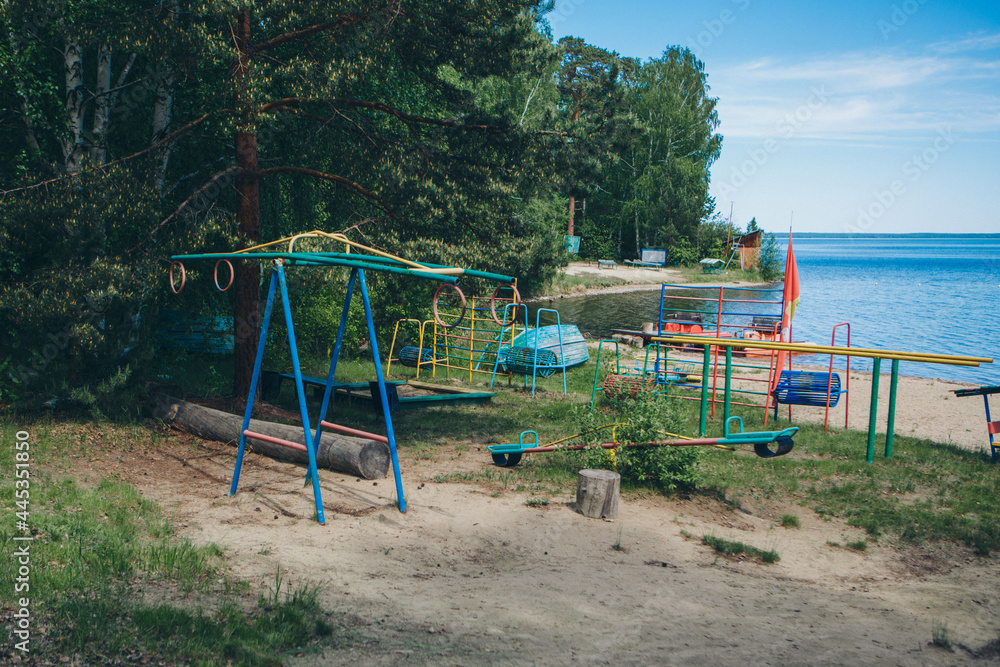 View of the playground by the lake. recreation area by the water