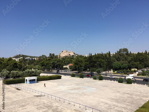 Wallpaper Mural View of the Parthenon on the Athenian Acropolis and the Philopappos Monument on Mouseion Hill, seen from the tribunes of the Panathenaic Stadium or Kallimarmaro in Athens, Greece. Torontodigital.ca