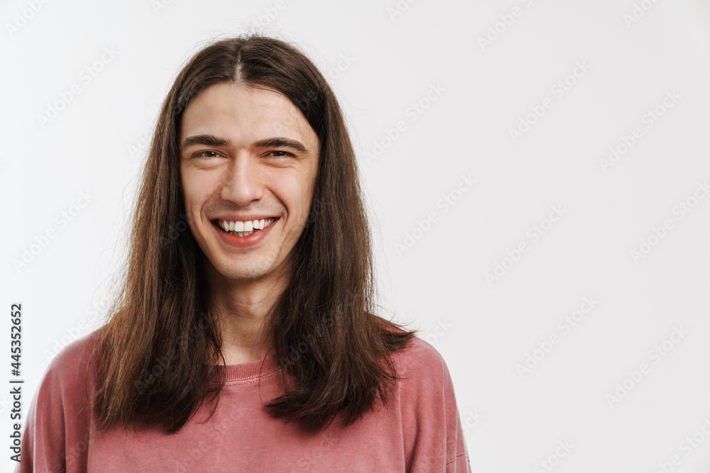 Portrait of a young white casual man with long brown hair Portrait of a young white casual man with long brown hair