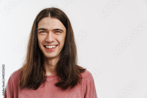 Portrait of a young white casual man with long brown hair © Drobot Dean