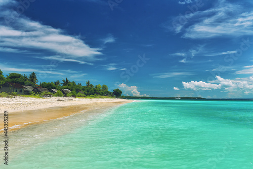 Fototapeta Naklejka Na Ścianę i Meble -  Landscape of tropical island beach cloudy blue sky