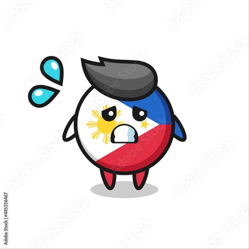 philippines flag badge mascot character with afraid gesture © heriyusuf