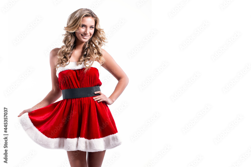 Young beautiful Santa girl in Short festive dress fur, Long blonde hair, Bright make up, Conceptual fashion art. Young beautiful Santa girl in Short festive dress fur, Long blonde hair, Bright make up, Conceptual fashion art.