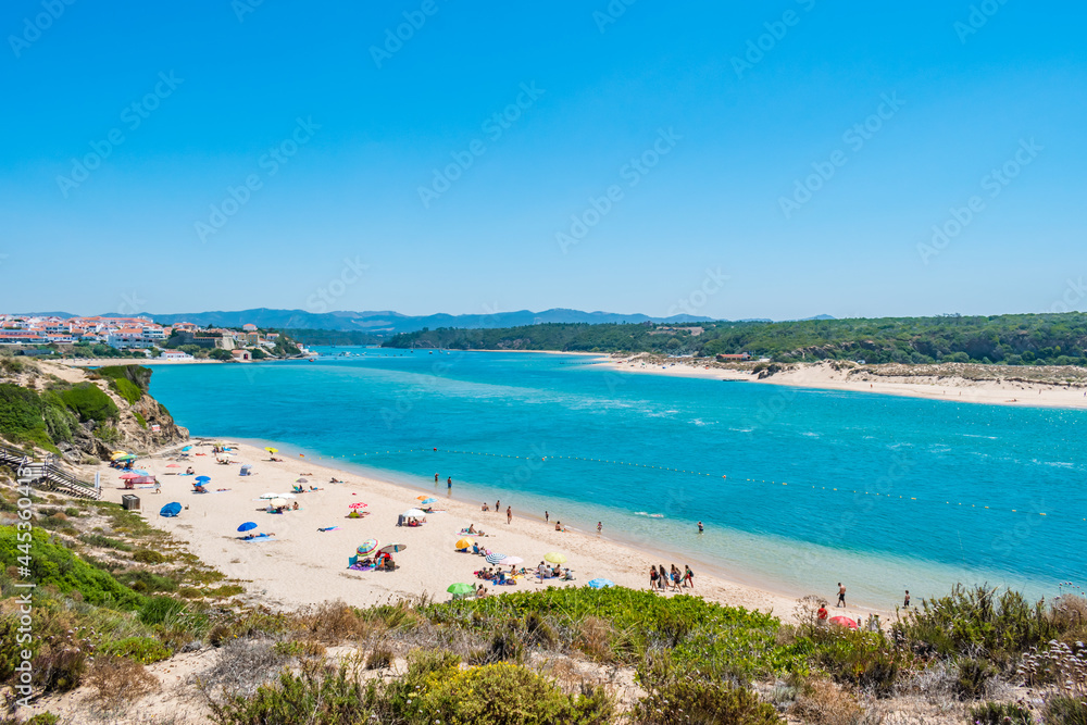Franquia beach in Milfontes with river Mira and village in the background, Odemira PORTUGAL