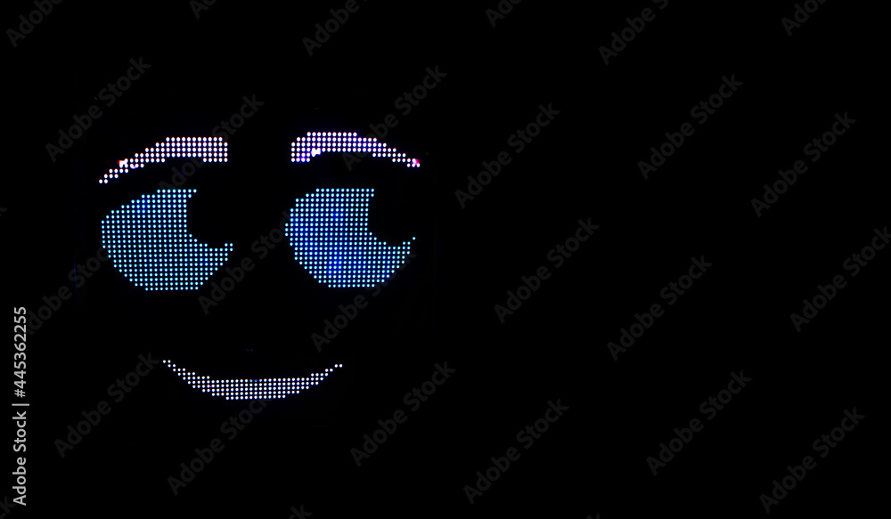 smiling robot face with blue eyes on a black background, artificial intelligence smiling robot face with blue eyes on a black background, artificial intelligence