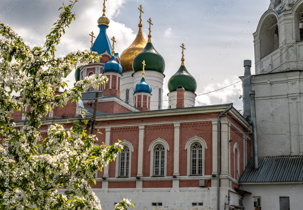 Towers and dome of temples and churches with white walls in Kolomna at the Cathedral Square