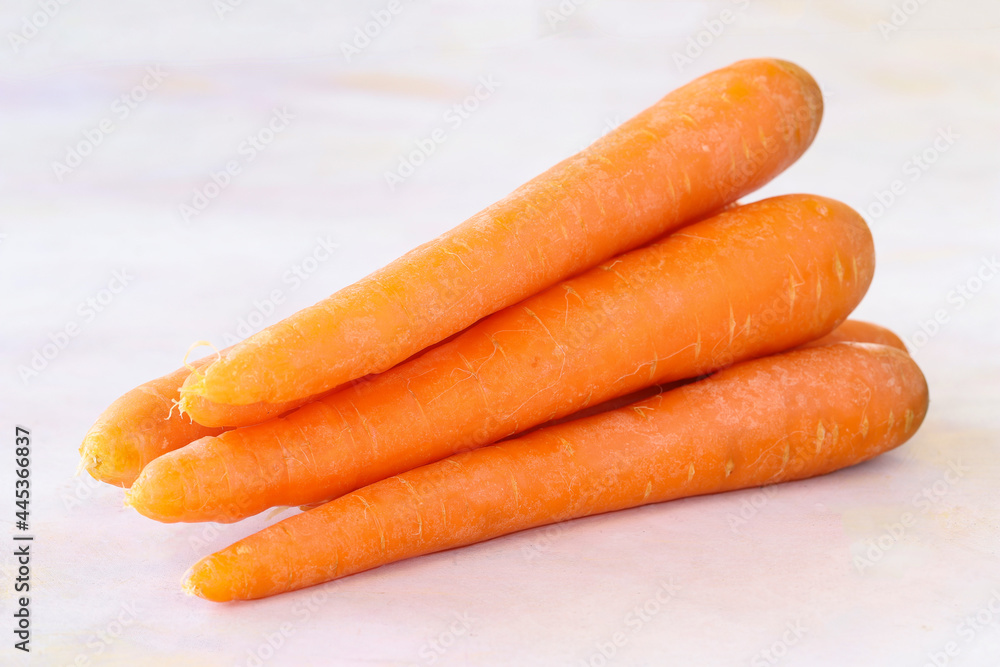 Carrots on a white wooden background Carrots on a white wooden background