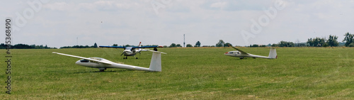 Gliders on the airfield waiting to go into the air. Aircrafts for active extreme sports