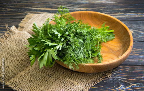 fresh parsley on wooden background