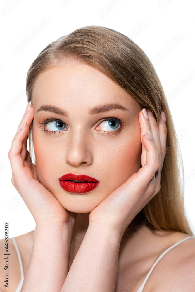young woman with blue eyes and red lips looking away isolated on white