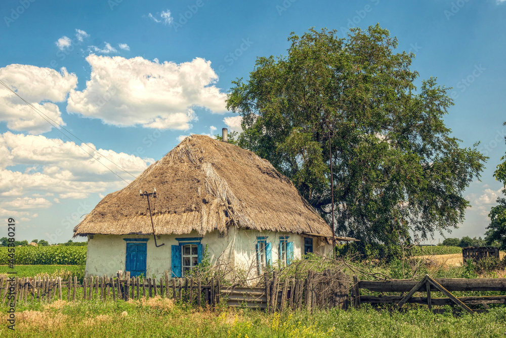 Old abandoned clay house with thatched roof Old abandoned clay house with thatched roof