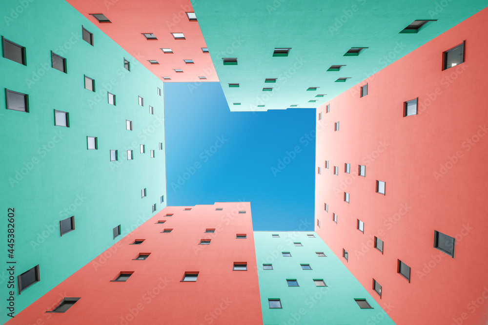 colorful building facade and blue sky  - courtyard - obrazy, fototapety, plakaty 